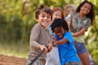 Children Being Active playing tug of war