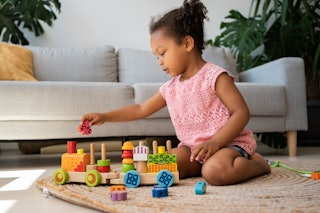 Early Childhood Education Training - Child Playing with Blocks