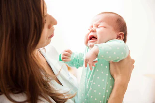 Newborn baby hunger cues hungry