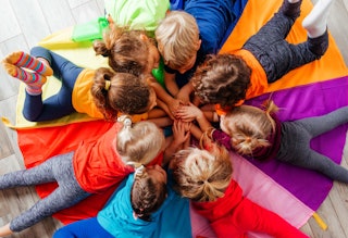 Preschool Children Playing in Classroom