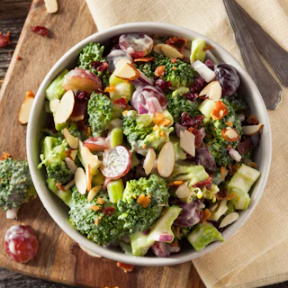 Homemade Green Broccoli Salad with Grapes Onion and Bacon